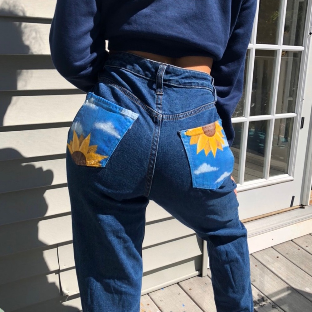 Hand painted sunflower on high waisted jeans